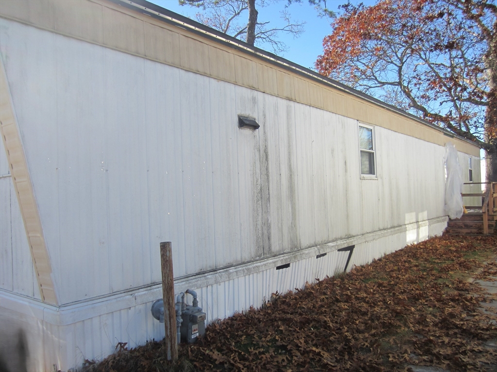 3040 Cranberry Highway, Unit 10 Wareham, MA 02538 - Photo 4 of 22 a view of a garage