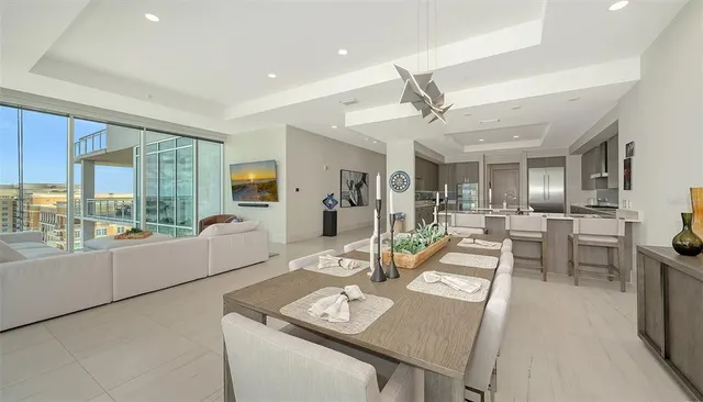a view of a room with wooden floor and windows