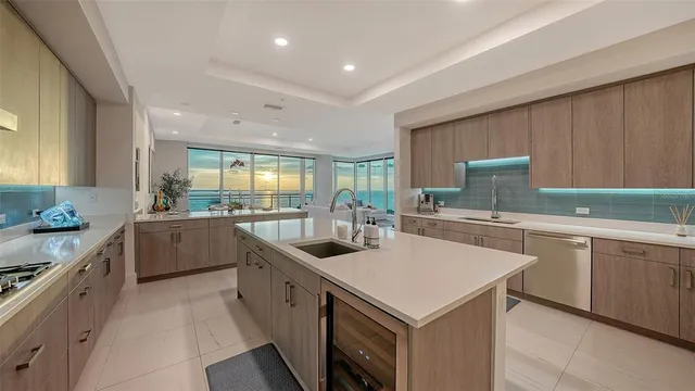 a bathroom with a shower sink and mirror