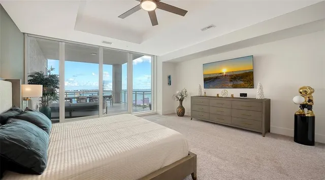 a building outdoor space with patio furniture and potted plants