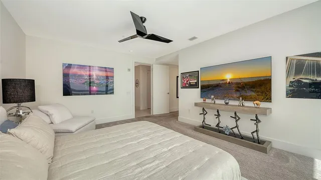 a view of a living room with a flat screen tv