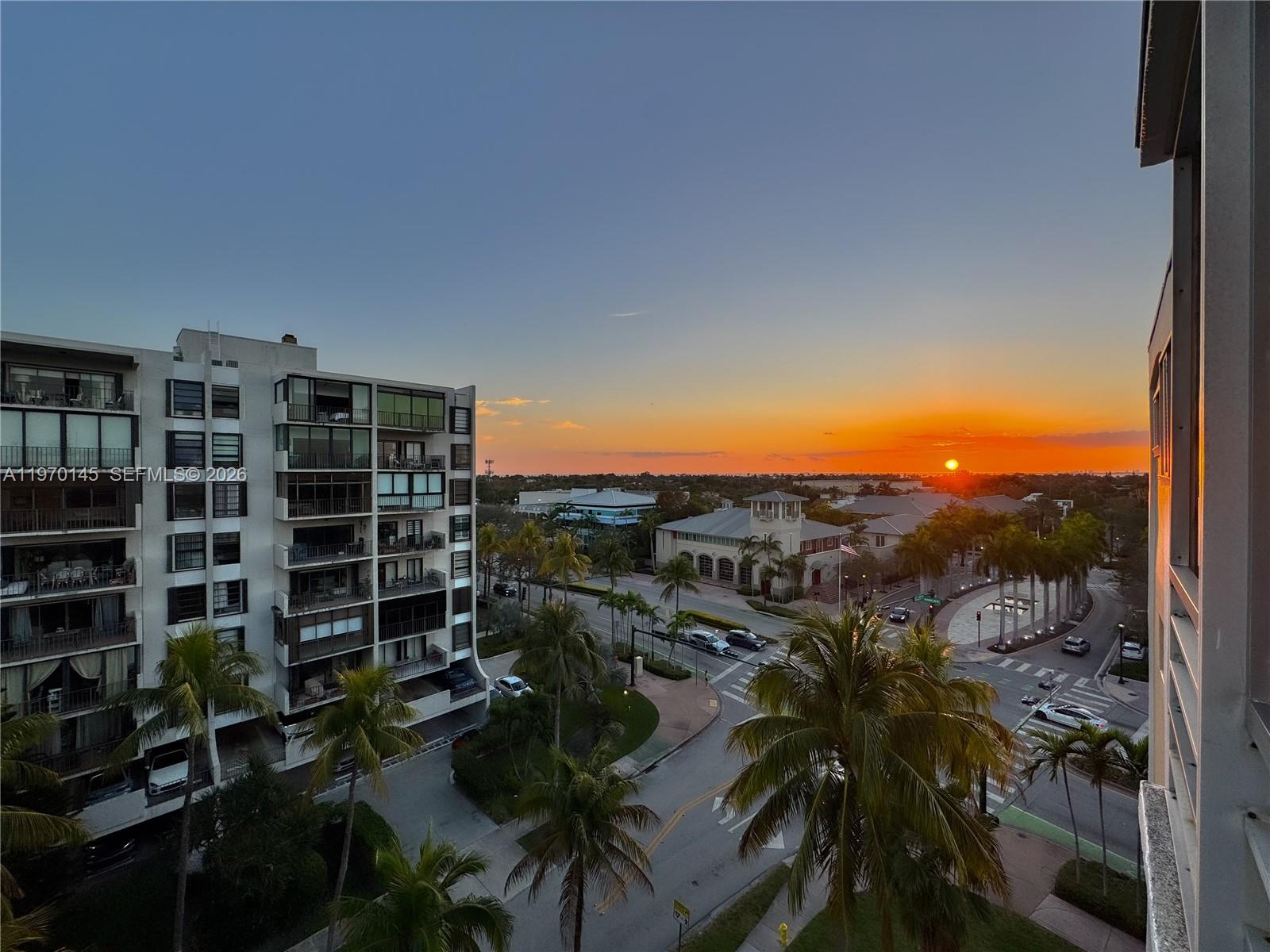 555 Crandon Boulevard, Unit 82 Key Biscayne, FL 33149 - Photo 24 of 28 a view of a balcony with water view and plants