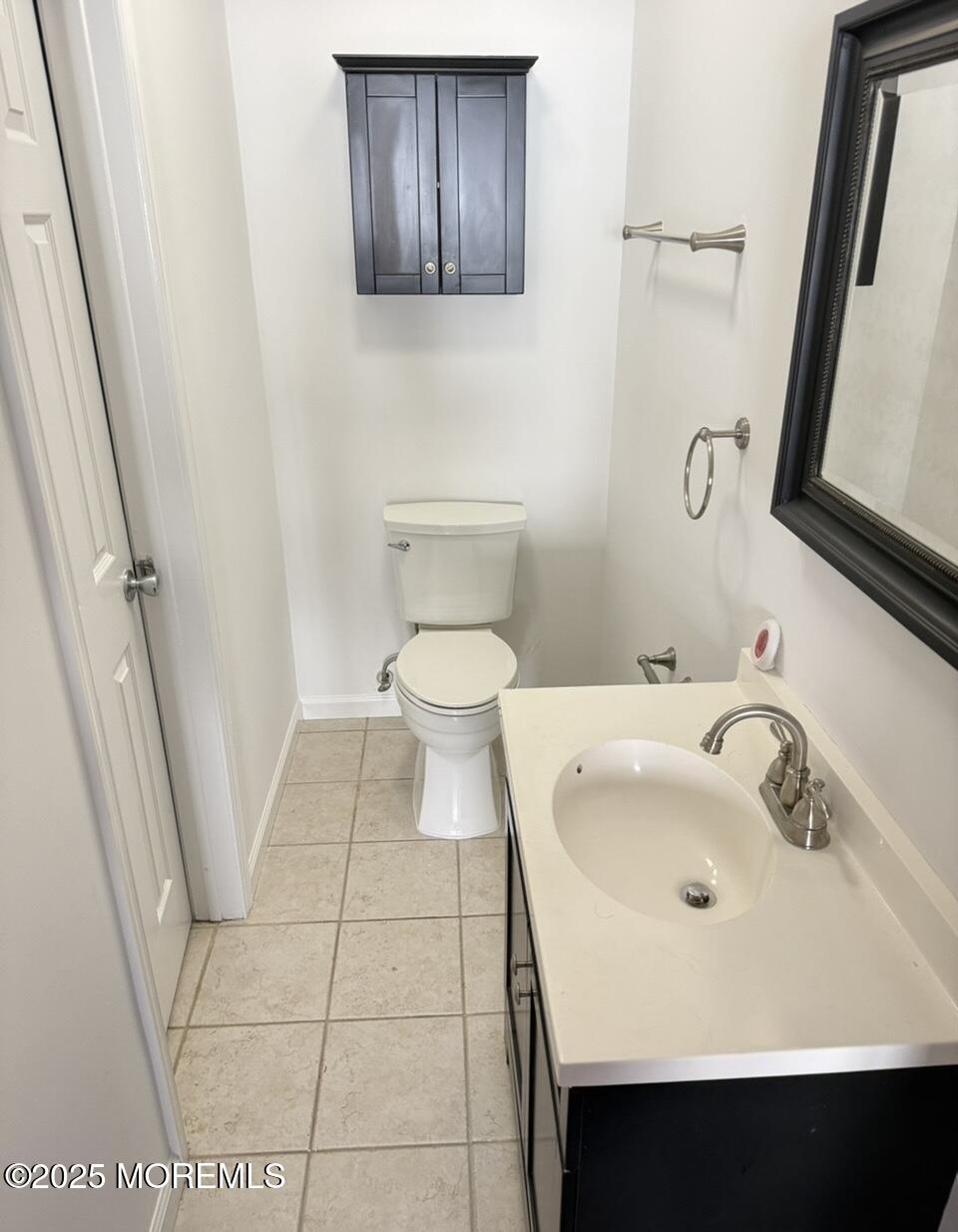 17-7 Augusta Court Freehold, NJ 07728 - Photo 5 of 6 a bathroom with a sink and a toilet