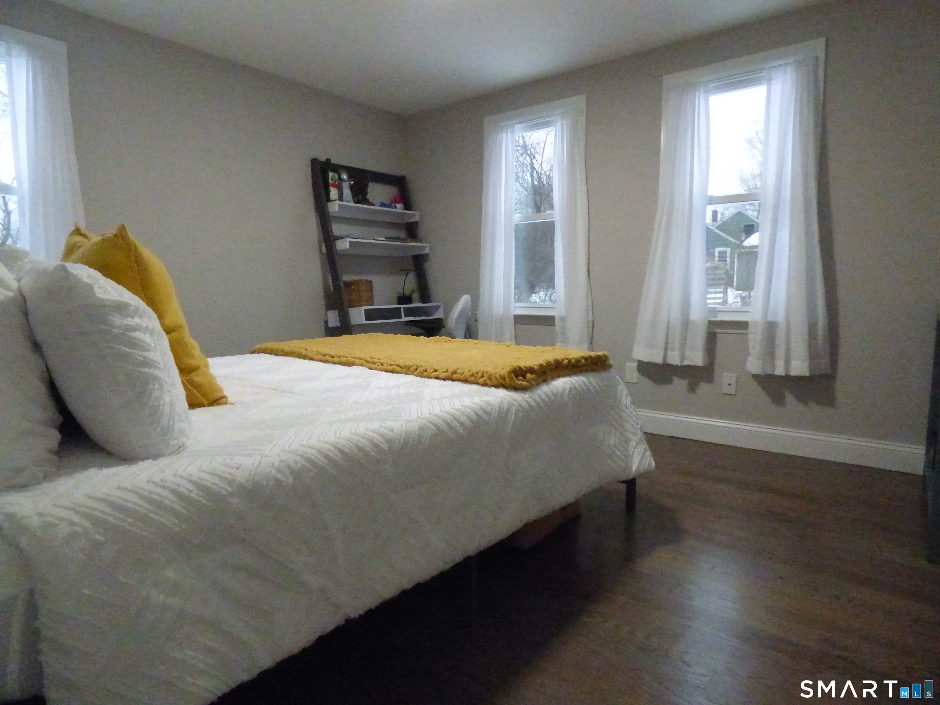40 Mt Pleasant Road Newtown, CT 06470 - Photo 14 of 23 a bedroom with a bed and wooden floor