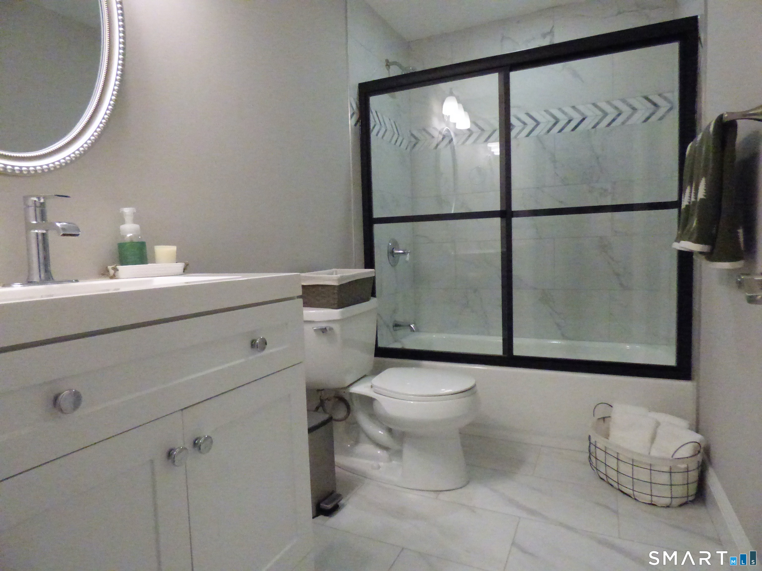 40 Mt Pleasant Road Newtown, CT 06470 - Photo 16 of 23 a bathroom with a sink toilet and a mirror