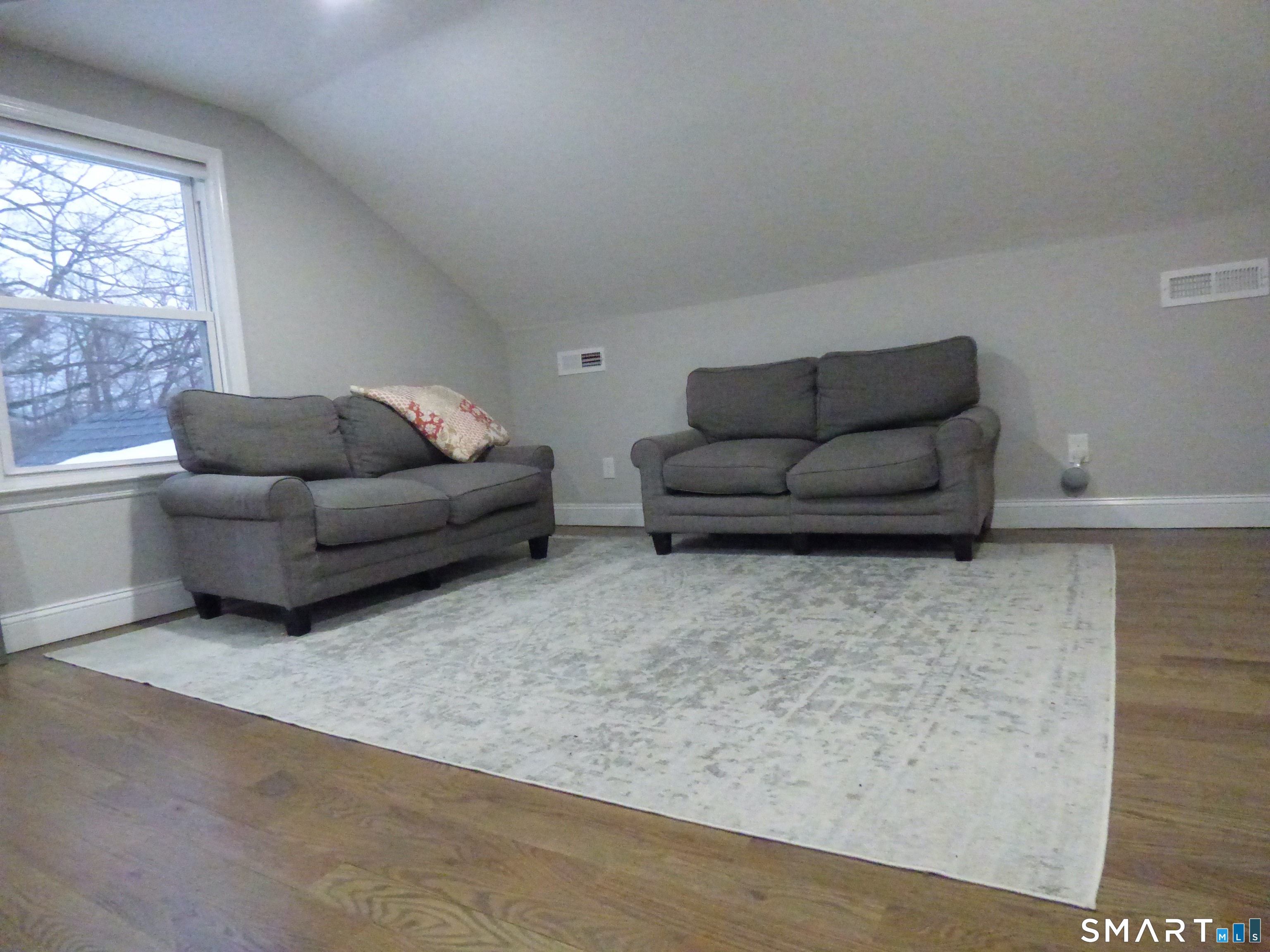 40 Mt Pleasant Road Newtown, CT 06470 - Photo 19 of 23 a living room with furniture and a large window