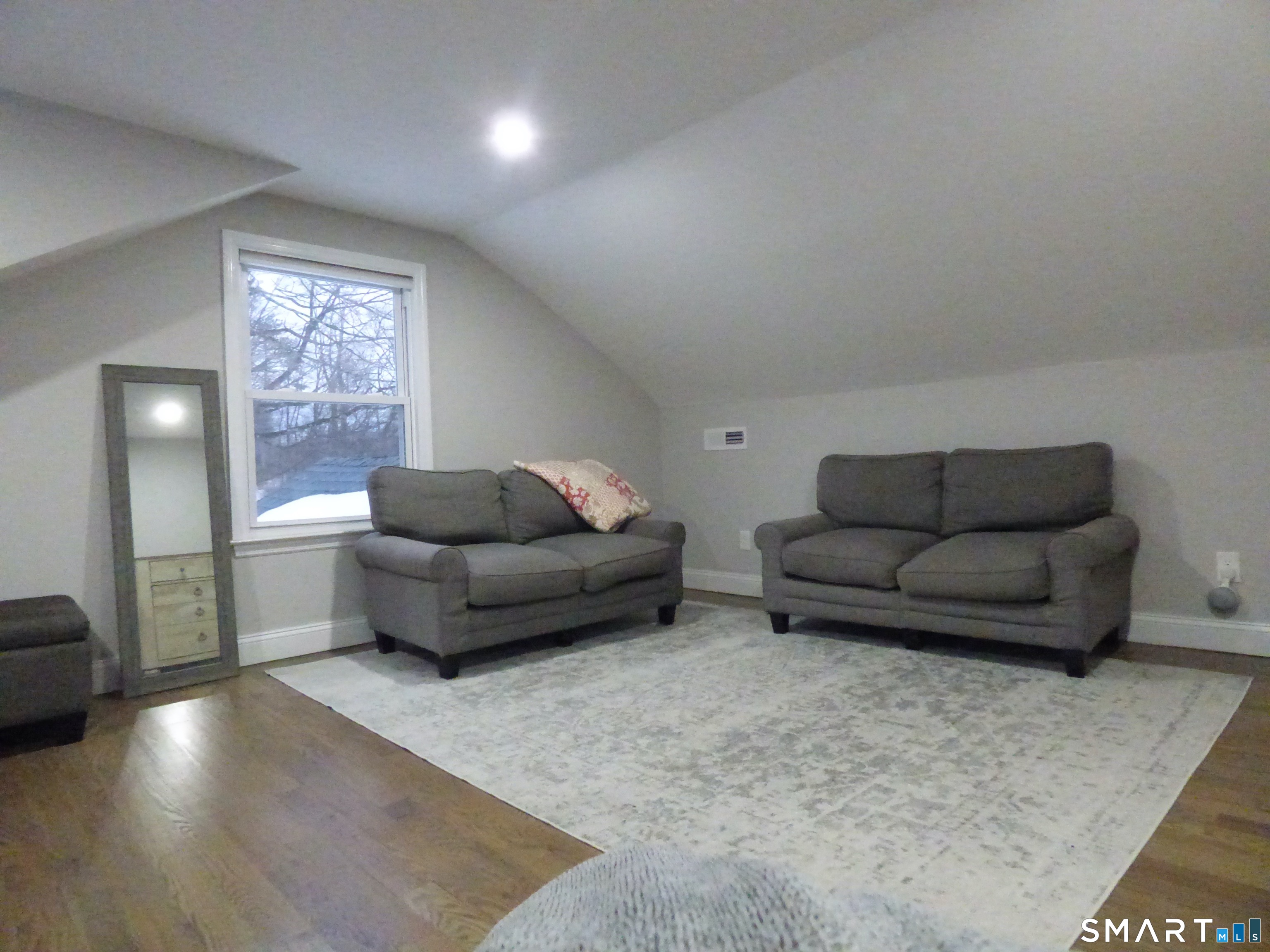 40 Mt Pleasant Road Newtown, CT 06470 - Photo 20 of 23 a living room with furniture and a couch
