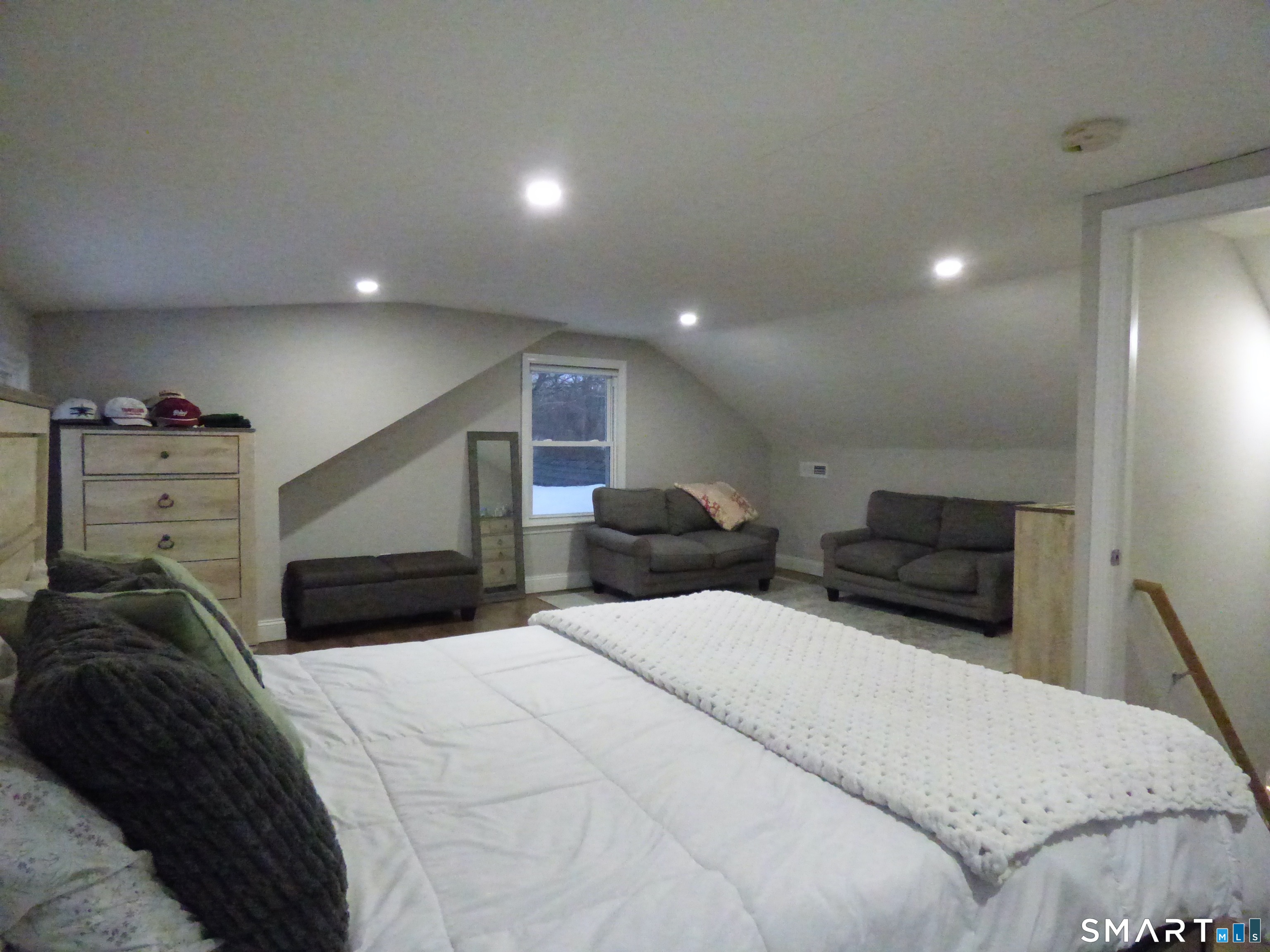 40 Mt Pleasant Road Newtown, CT 06470 - Photo 21 of 23 a bed room with a bed and a view of kitchen