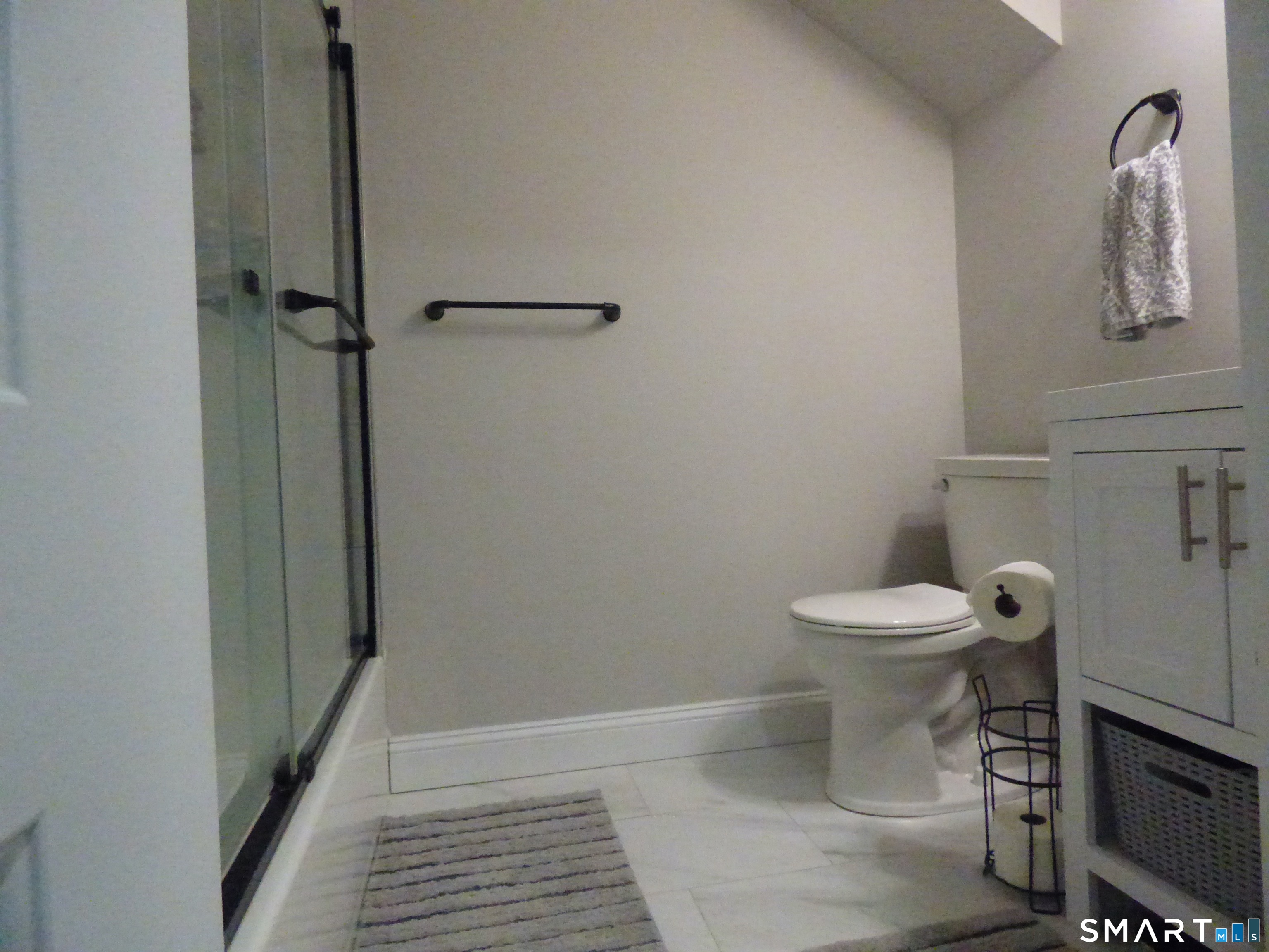 40 Mt Pleasant Road Newtown, CT 06470 - Photo 22 of 23 a white toilet sitting next to a shower