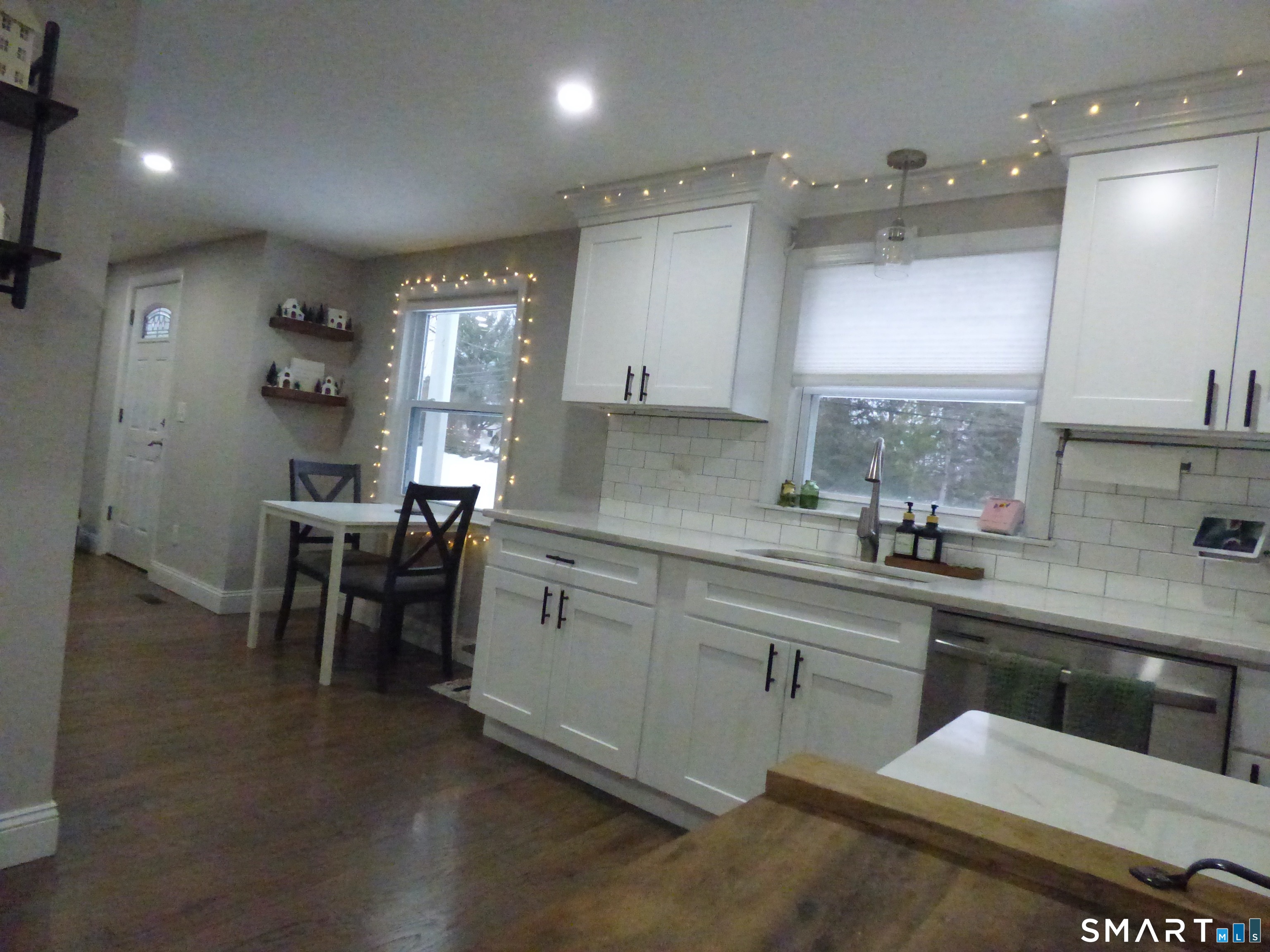 40 Mt Pleasant Road Newtown, CT 06470 - Photo 7 of 23 a kitchen with sink cabinets and window