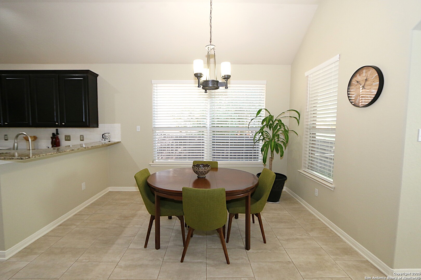 8614 Mantano Ridge Helotes, TX 78023 - Photo 11 of 36 a dining room with furniture and window