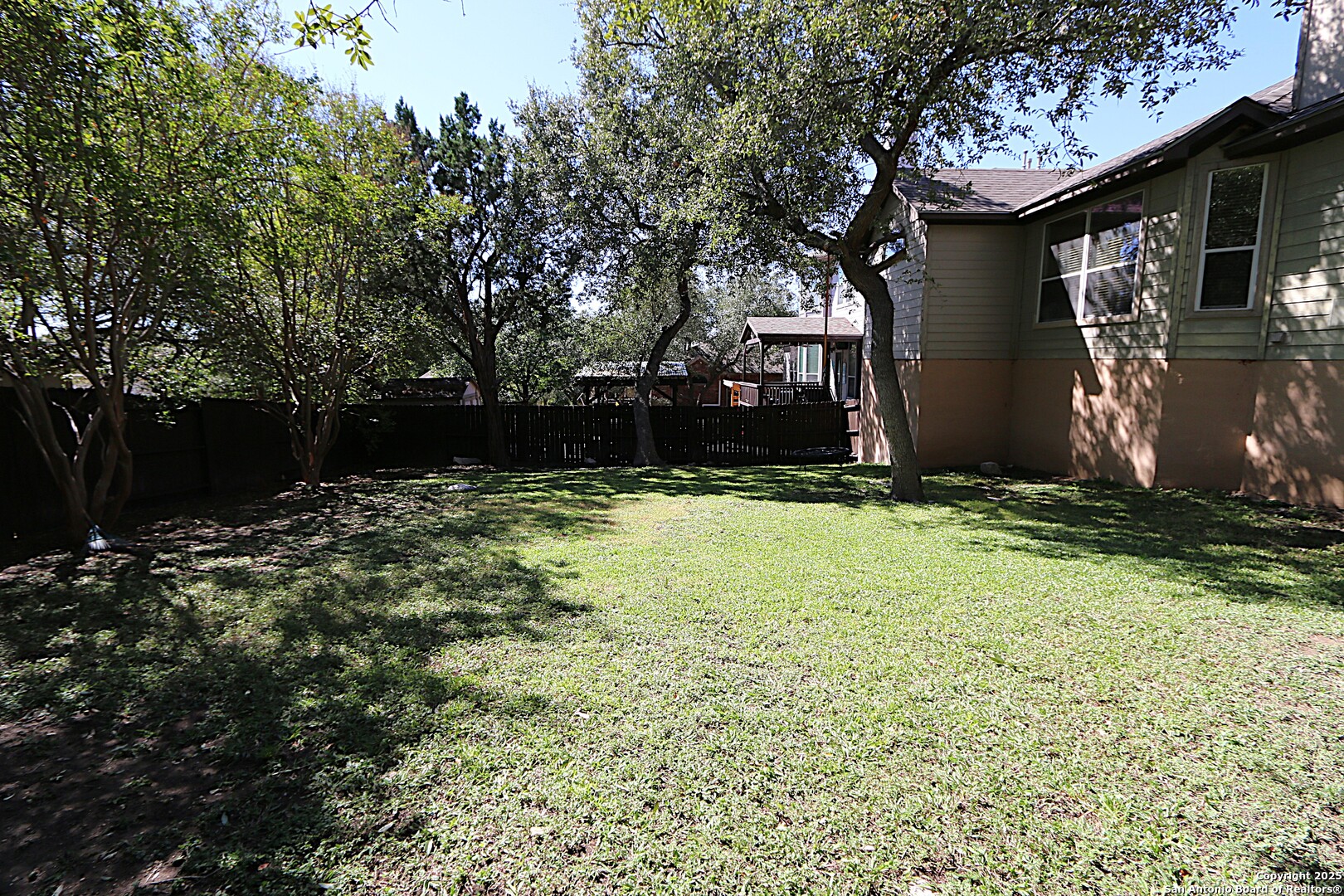 8614 Mantano Ridge Helotes, TX 78023 - Photo 32 of 36 a view of a back yard of the house