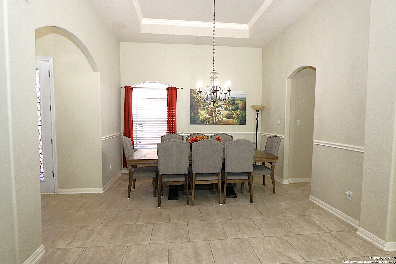 8614 Mantano Ridge Helotes, TX 78023 - Photo 7 of 36 a view of a dining room with furniture and chandelier