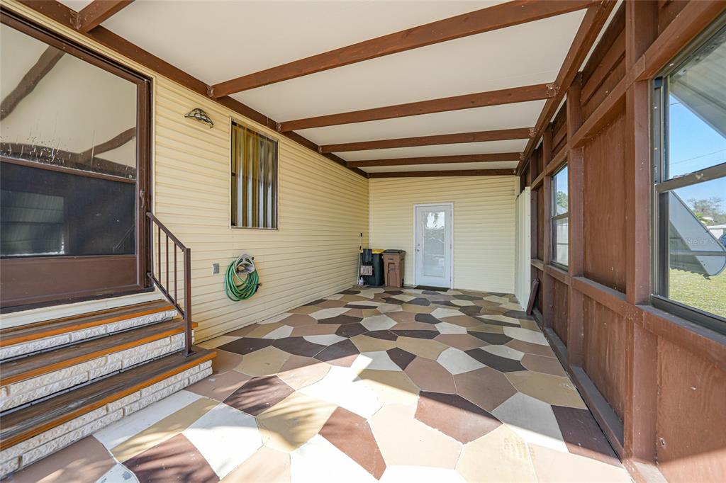 10101 Burnt Store Road, Unit 54 Punta Gorda, FL 33950 - Photo 5 of 28 a view of a porch