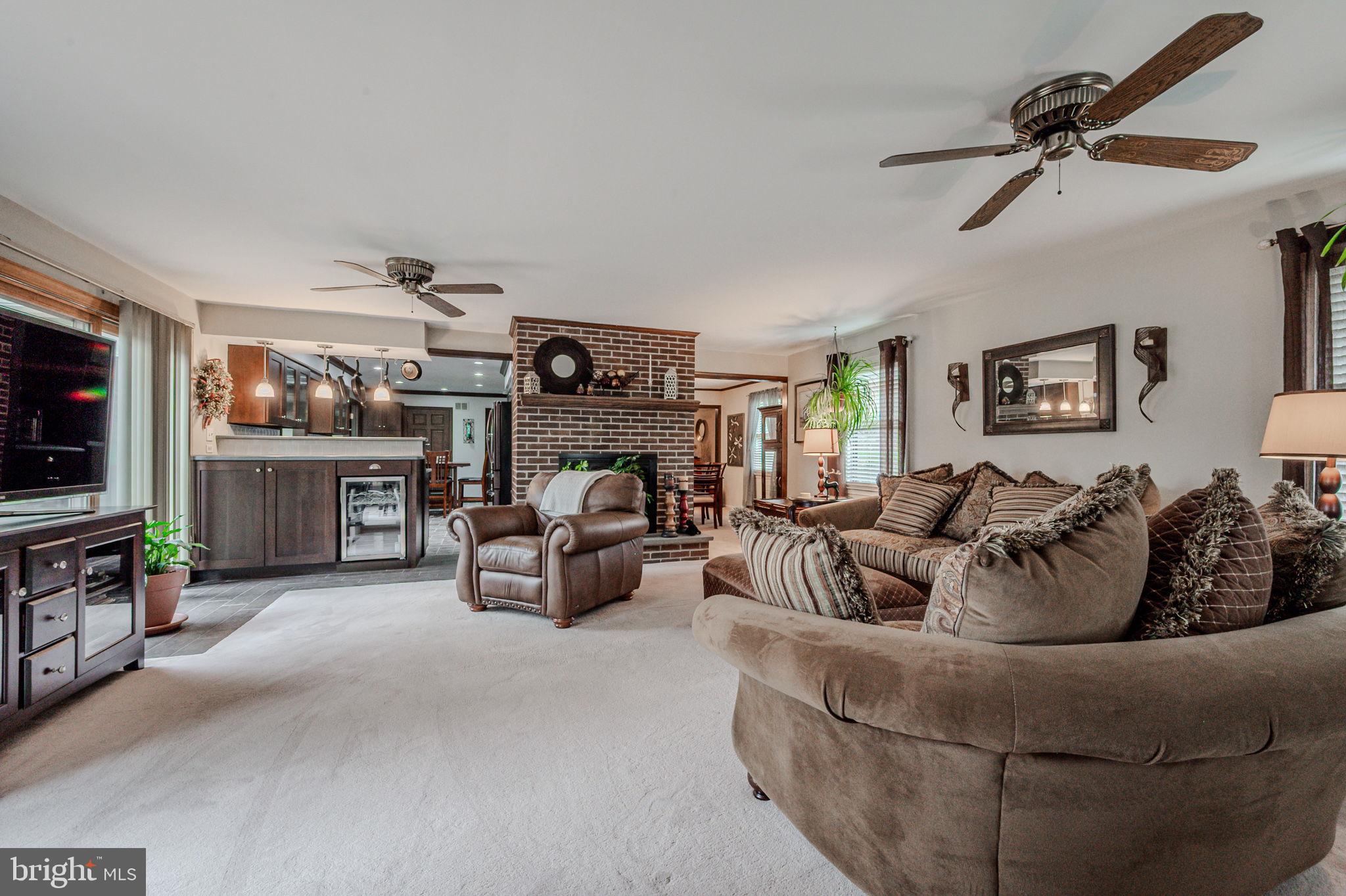 211 Old Ashley Drive Elkton, MD 21921 - Photo 15 of 50 a living room with furniture and a flat screen tv