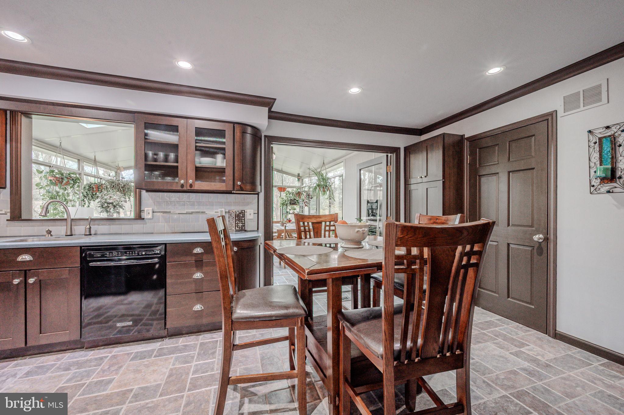 211 Old Ashley Drive Elkton, MD 21921 - Photo 22 of 50 a view of a dining room with furniture window and outside view