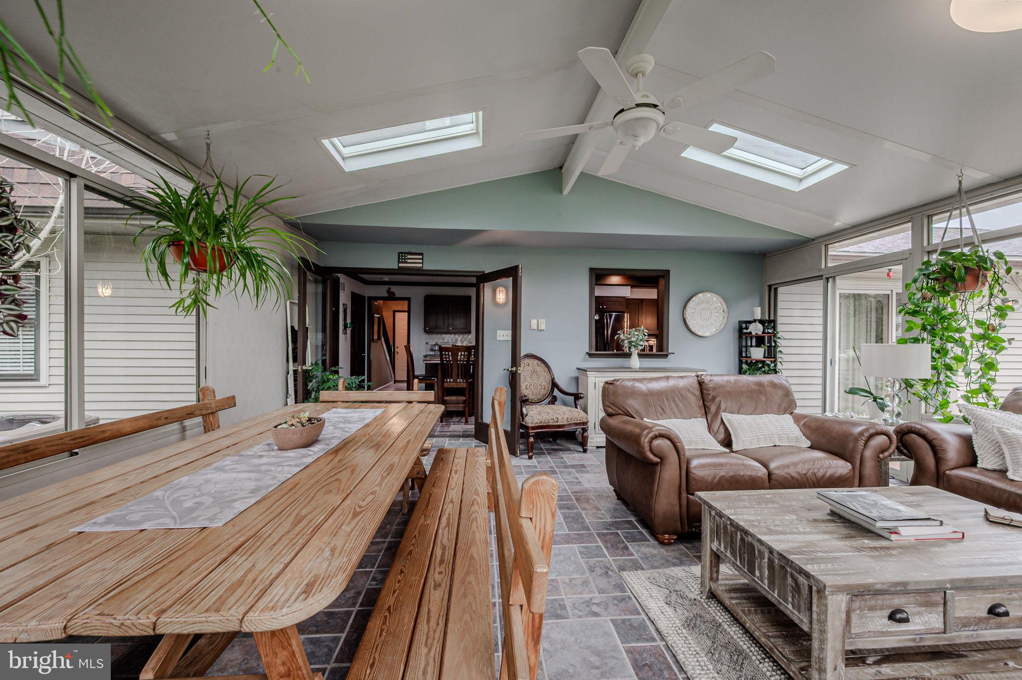 211 Old Ashley Drive Elkton, MD 21921 - Photo 27 of 50 a living room with furniture and a potted plant
