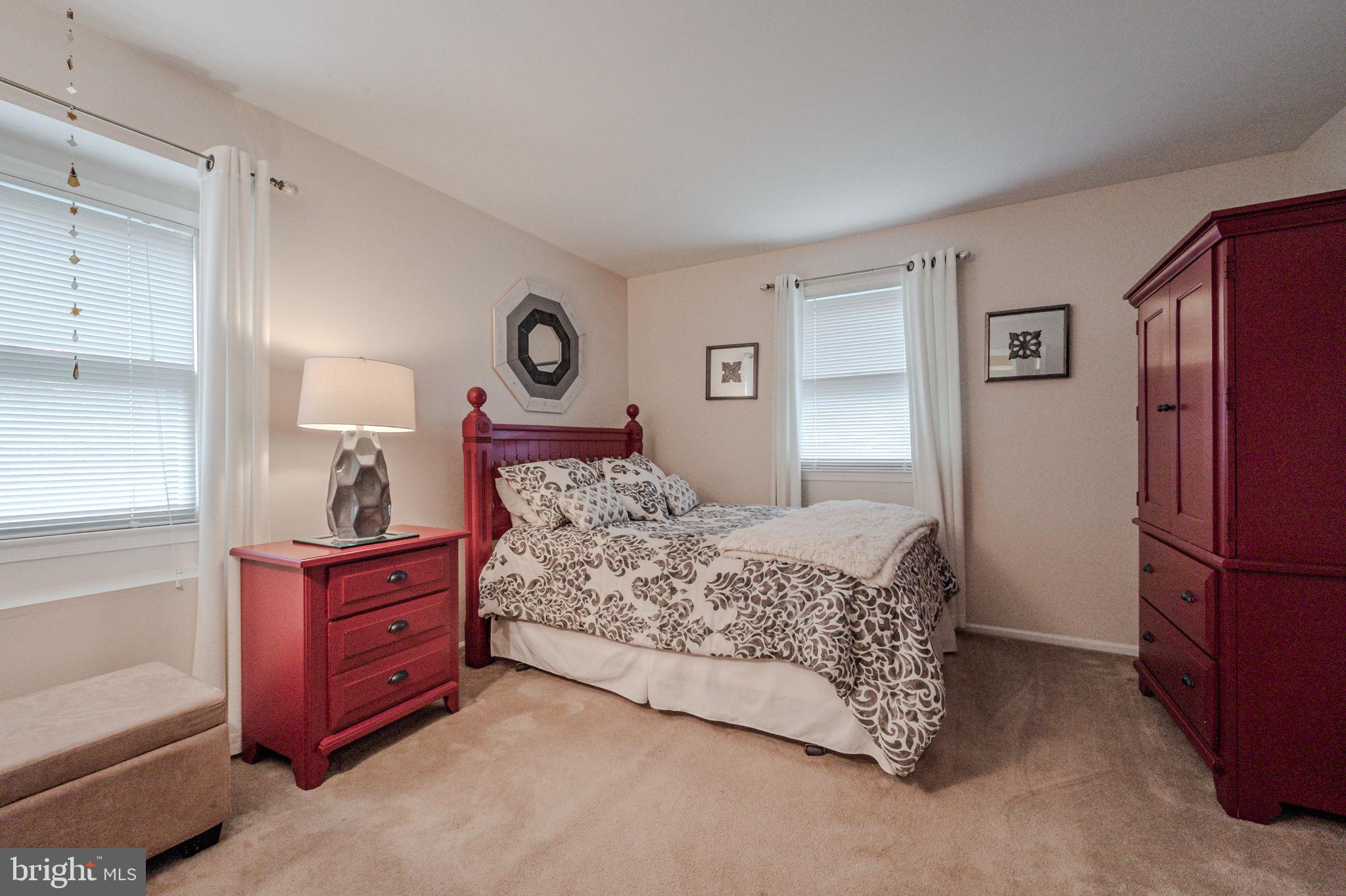 211 Old Ashley Drive Elkton, MD 21921 - Photo 28 of 50 a bedroom with a bed and a cabinets