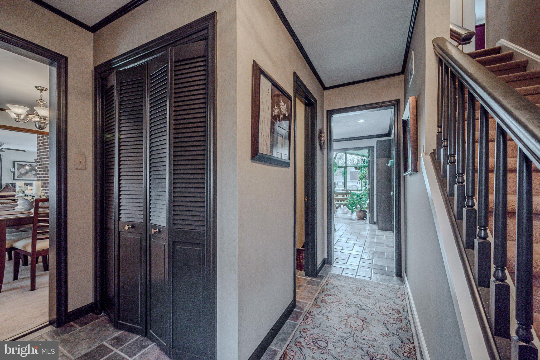 211 Old Ashley Drive Elkton, MD 21921 - Photo 3 of 50 a view of a hallway with wooden floor and stairs