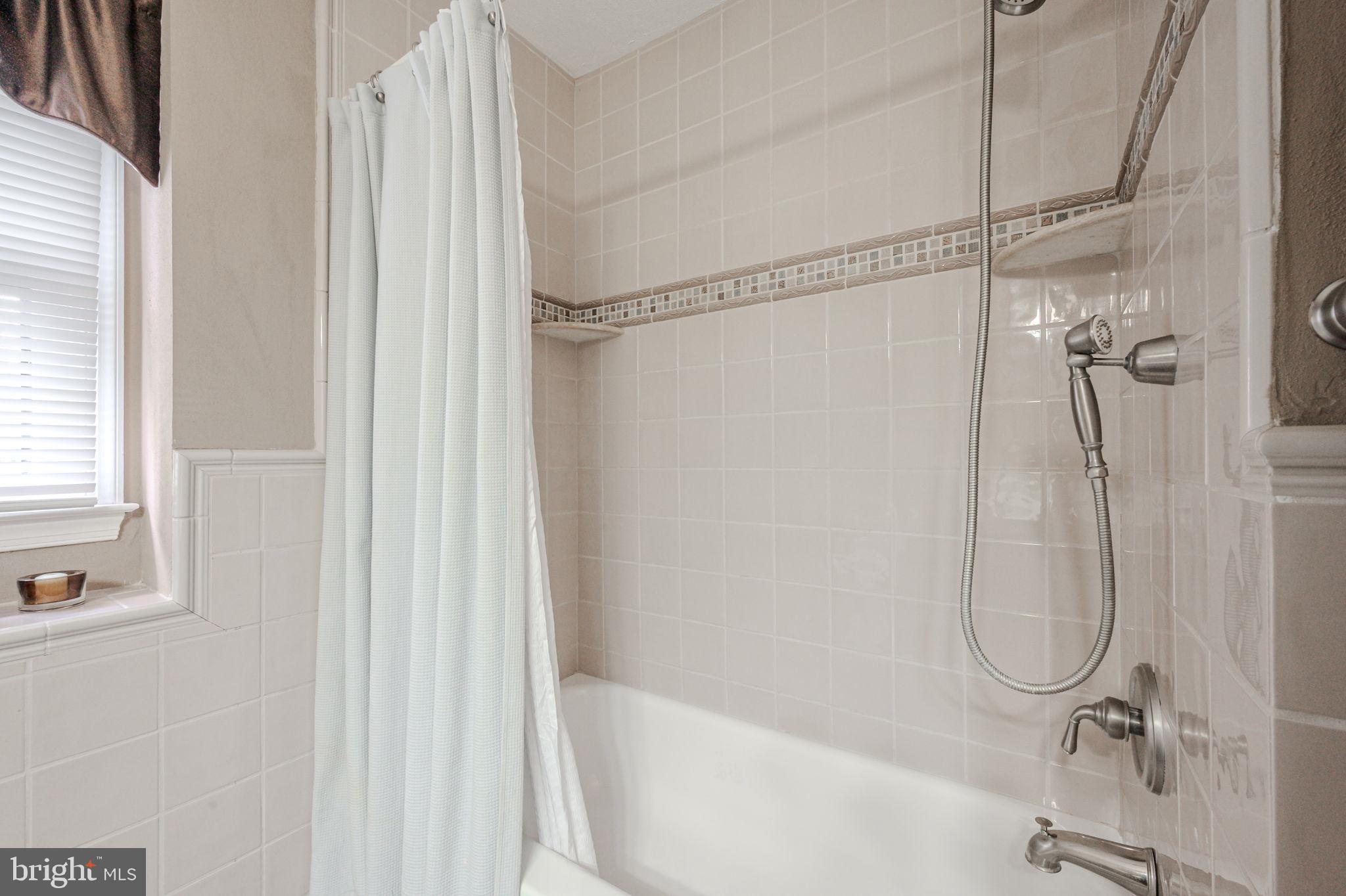 211 Old Ashley Drive Elkton, MD 21921 - Photo 31 of 50 a bathroom with a bath tub