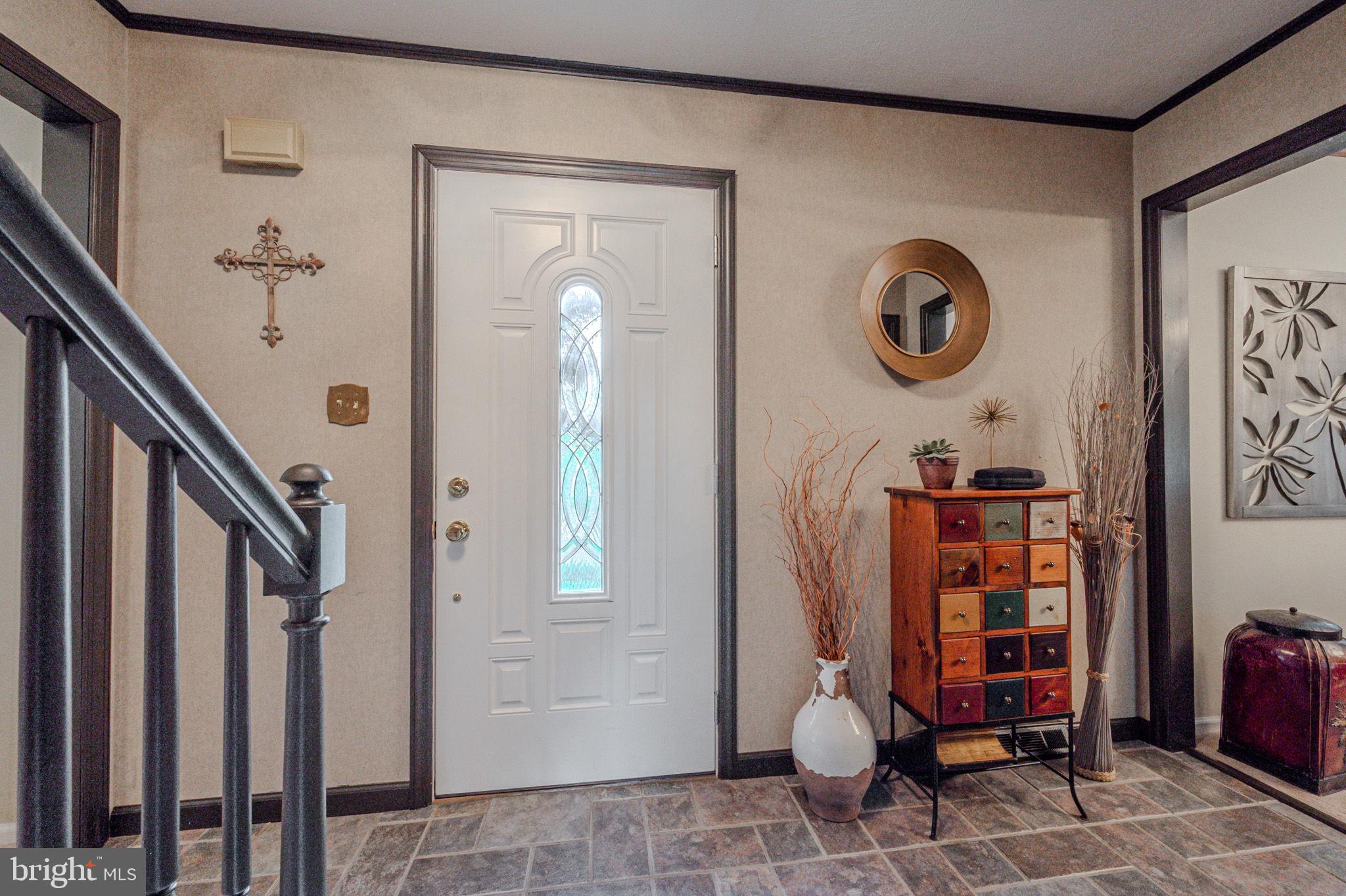 211 Old Ashley Drive Elkton, MD 21921 - Photo 4 of 50 a view of an entryway with wooden floor