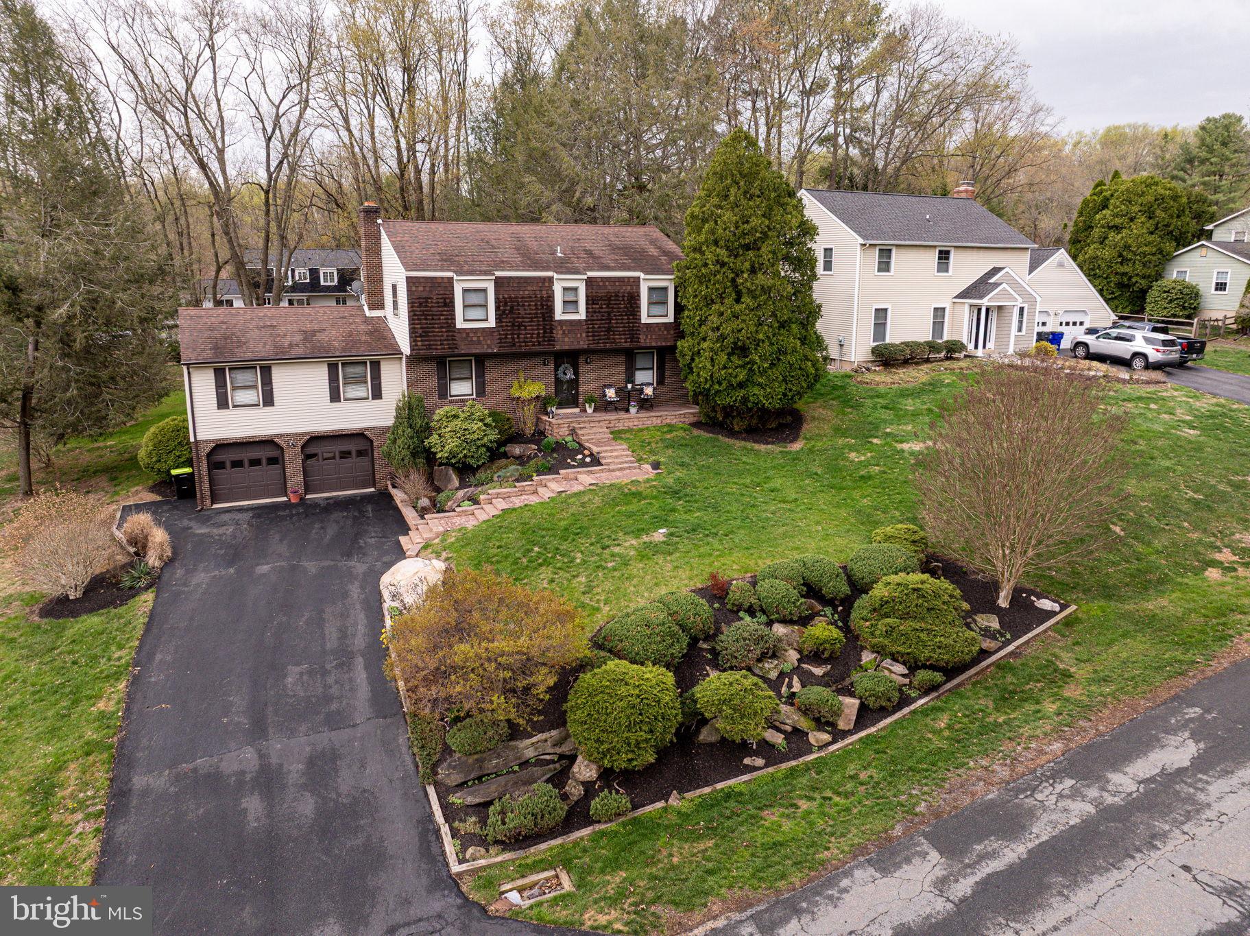 211 Old Ashley Drive Elkton, MD 21921 - Photo 47 of 50 a front view of a house with garden
