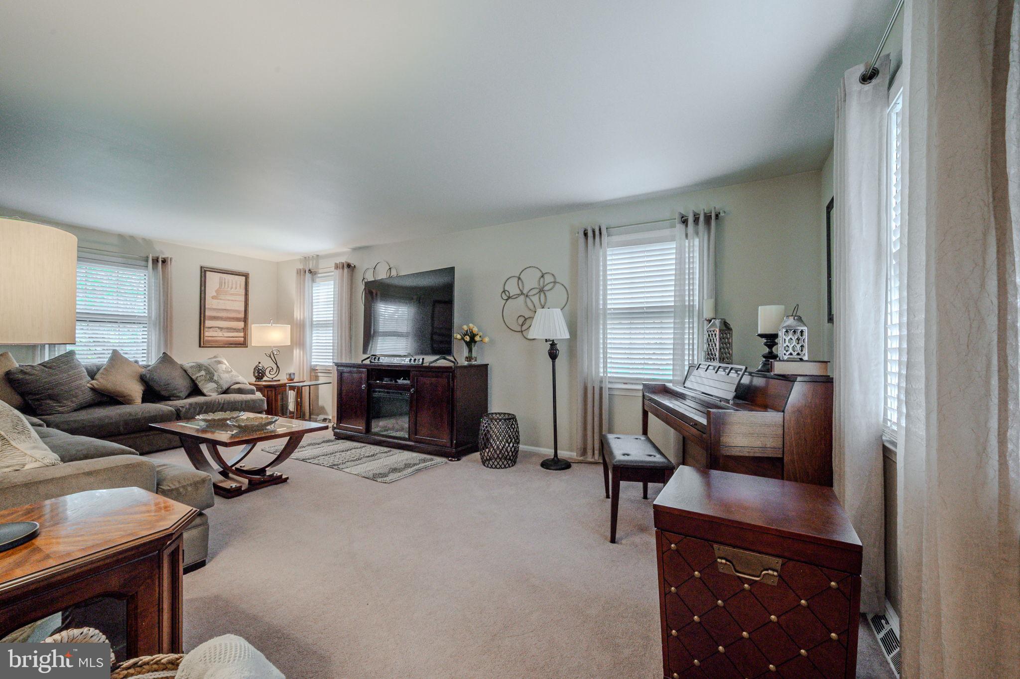 211 Old Ashley Drive Elkton, MD 21921 - Photo 6 of 50 a living room with furniture and a flat screen tv