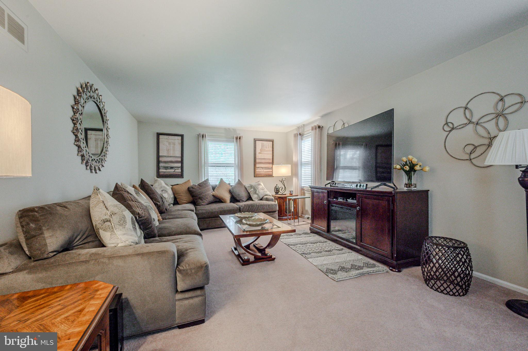 211 Old Ashley Drive Elkton, MD 21921 - Photo 8 of 50 a living room with furniture a couch and a flat screen tv