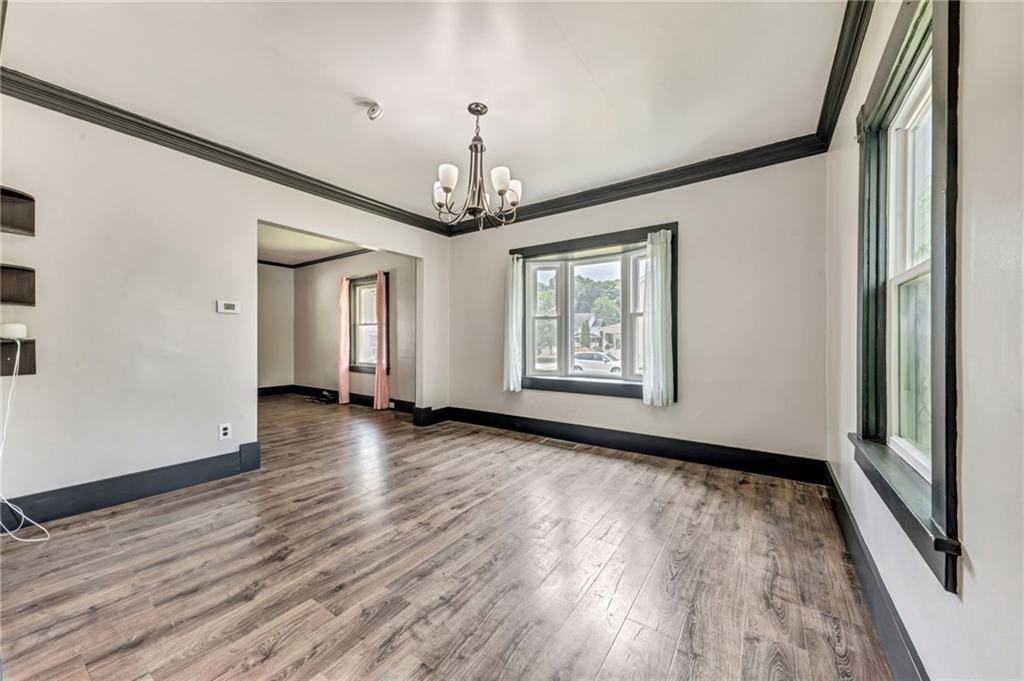 215 Independence Road Avella, PA 15312 - Photo 12 of 36 wooden floor in an empty room with a window