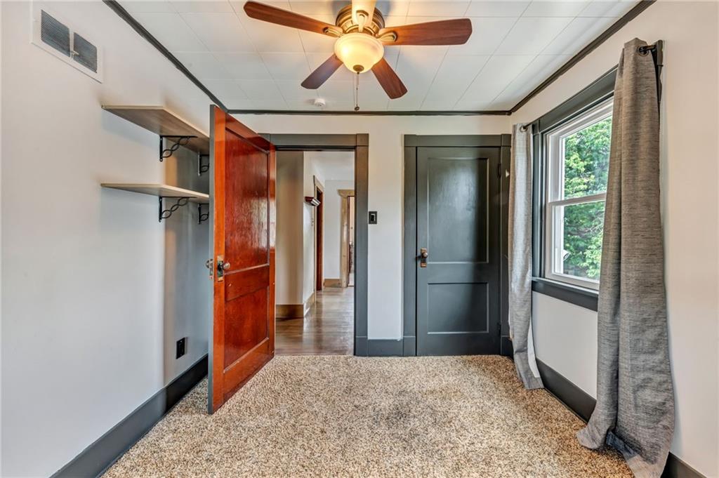 215 Independence Road Avella, PA 15312 - Photo 23 of 36 a view of hallway with a chandelier and a rug