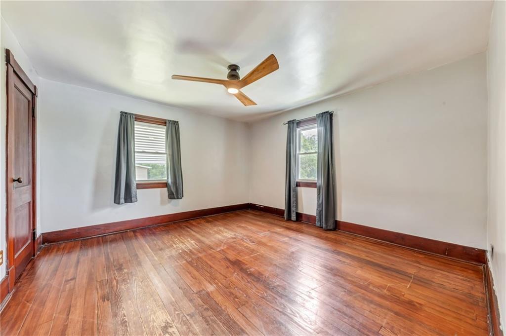 215 Independence Road Avella, PA 15312 - Photo 24 of 36 wooden floor in an empty room with a window