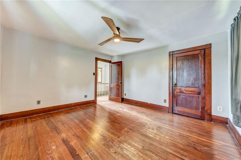 215 Independence Road Avella, PA 15312 - Photo 25 of 36 wooden floor in an empty room with a window