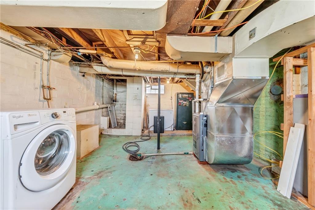 215 Independence Road Avella, PA 15312 - Photo 29 of 36 a view of a storage & utility room with washer and dryer