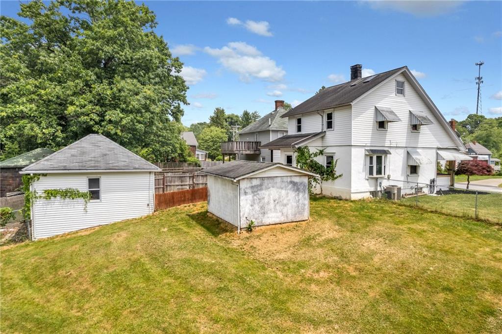 215 Independence Road Avella, PA 15312 - Photo 4 of 36 a view of a house with a yard