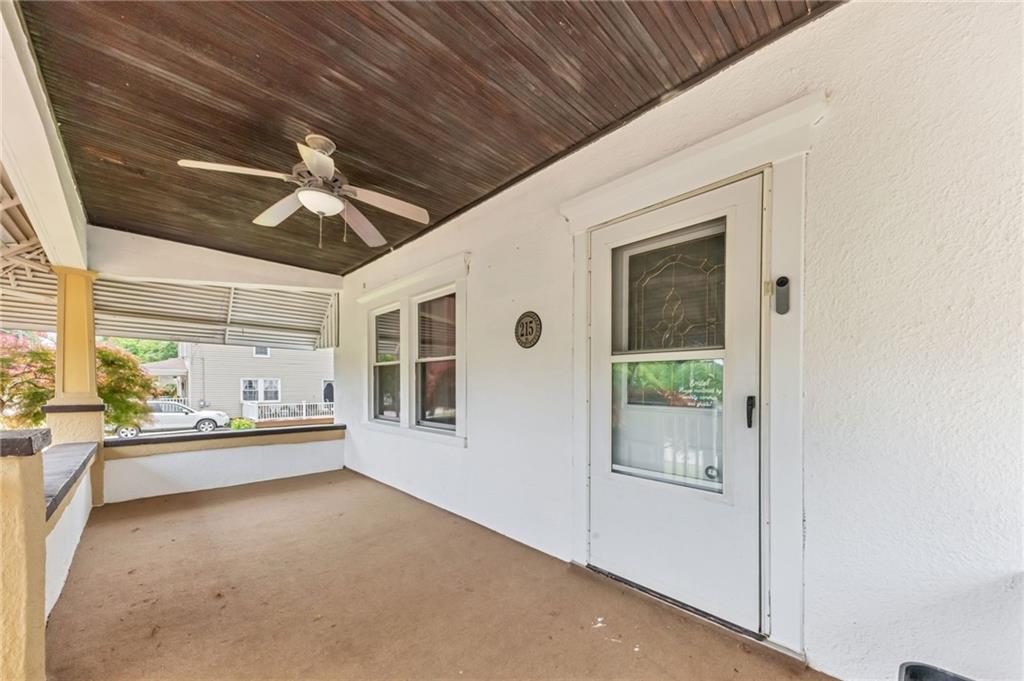 215 Independence Road Avella, PA 15312 - Photo 7 of 36 a very nice looking room with a large window and chandelier