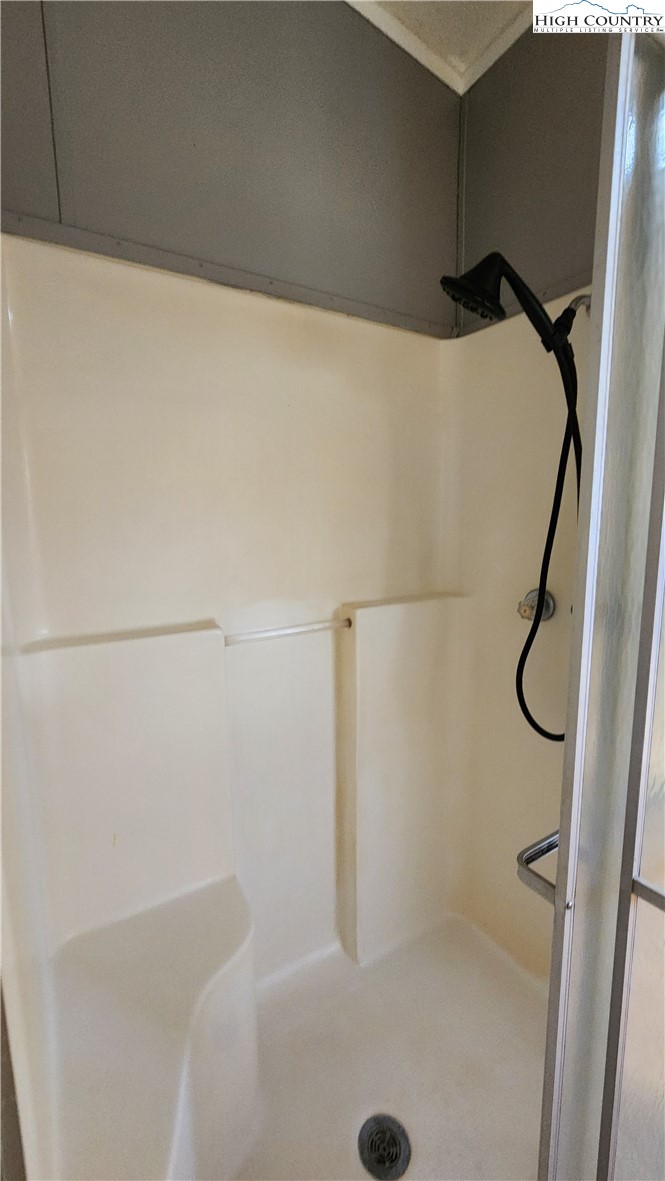 68 Rhoneys View Road Newland, NC 28657 - Photo 24 of 37 a bathroom with a shower