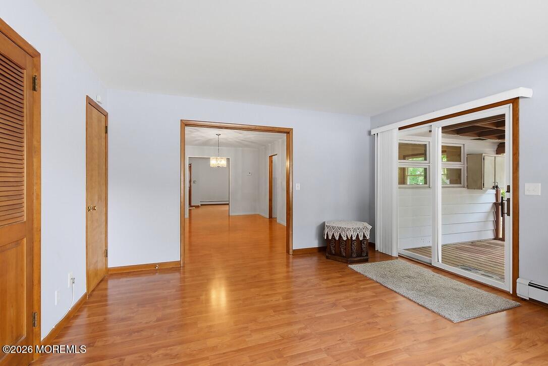 471 Drum Point Road Brick, NJ 08723 - Photo 11 of 25 Den with sliding glass door