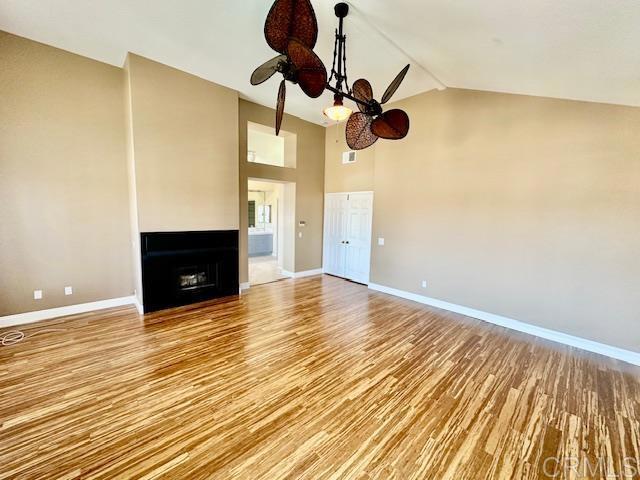 6947 Dusty Rose Place Carlsbad, CA 92011 - Photo 22 of 50 a view of an empty room with wooden floor