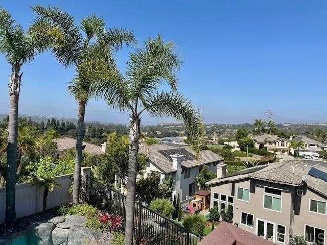 6947 Dusty Rose Place Carlsbad, CA 92011 - Photo 6 of 50 a view of a city with lots of potted plants