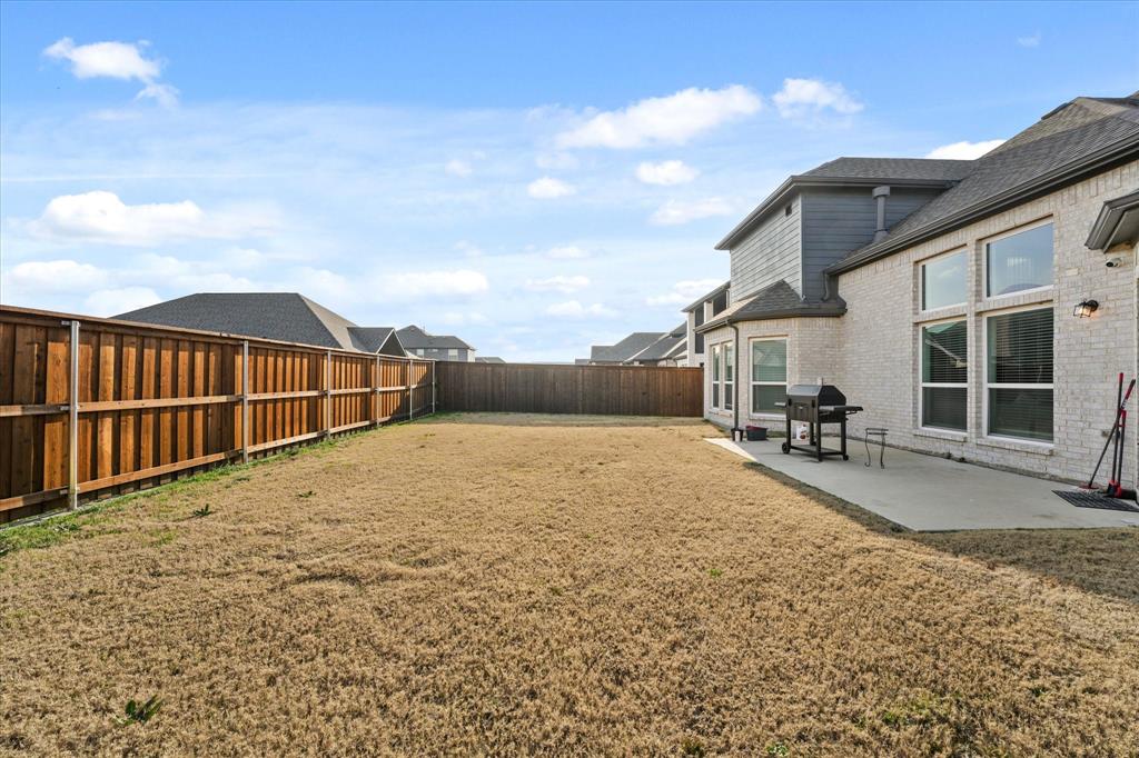 1111 Alaska Drive Forney, TX 75126 - Photo 16 of 30 a view of a backyard