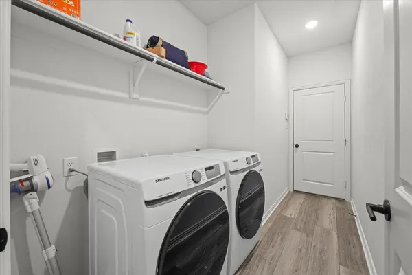 a utility room with dryer and washer