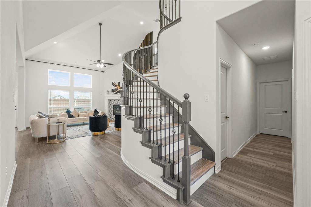 1111 Alaska Drive Forney, TX 75126 - Photo 6 of 30 a view of entryway and hall with wooden floor