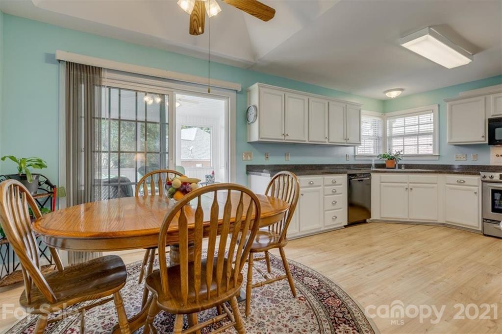 704 Beechnut Court Fort Mill, SC 29708 - Photo 11 of 46 a view of a dining room with furniture and window