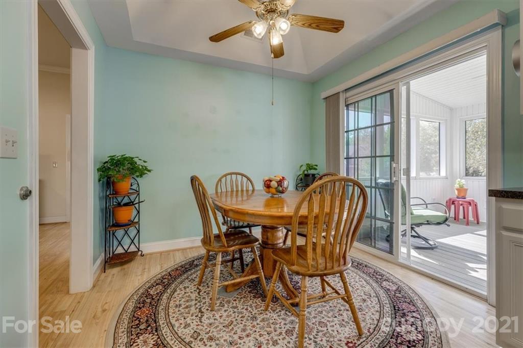 704 Beechnut Court Fort Mill, SC 29708 - Photo 18 of 46 a view of a dining room with furniture