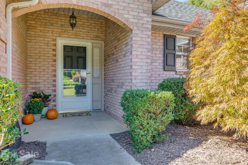 704 Beechnut Court Fort Mill, SC 29708 - Photo 3 of 46 a front view of a house with plants and flowers