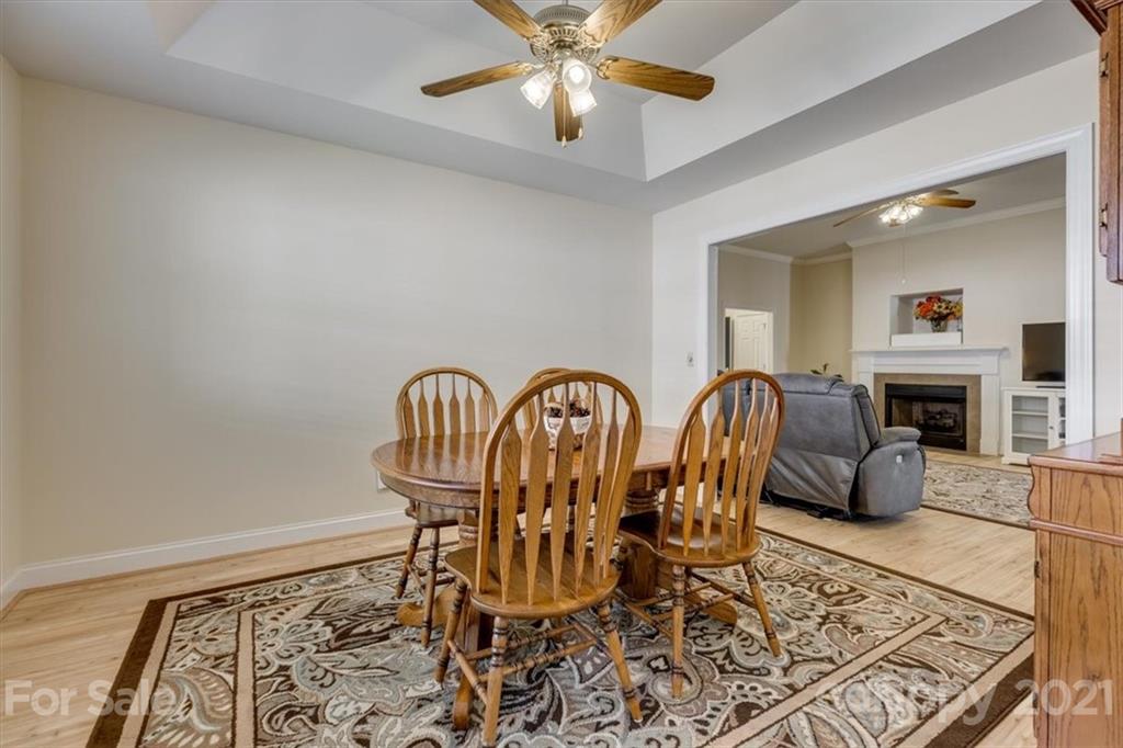 704 Beechnut Court Fort Mill, SC 29708 - Photo 22 of 46 a view of a dining room with furniture
