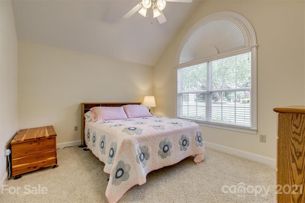 704 Beechnut Court Fort Mill, SC 29708 - Photo 35 of 46 a bedroom with a bed and a window