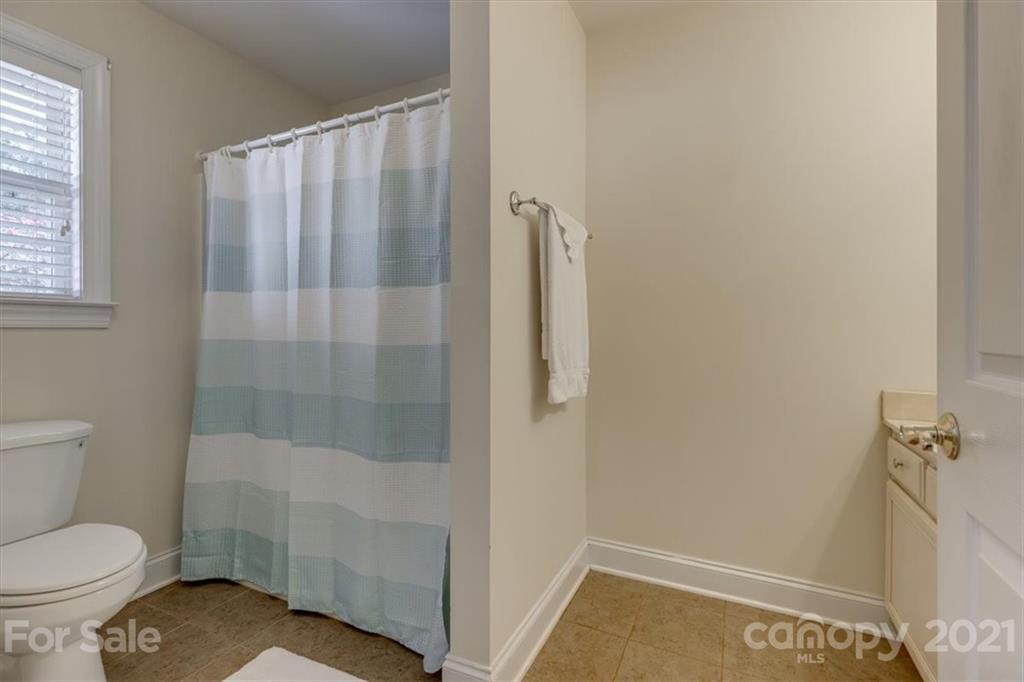 704 Beechnut Court Fort Mill, SC 29708 - Photo 37 of 46 a bathroom with a shower and a toilet
