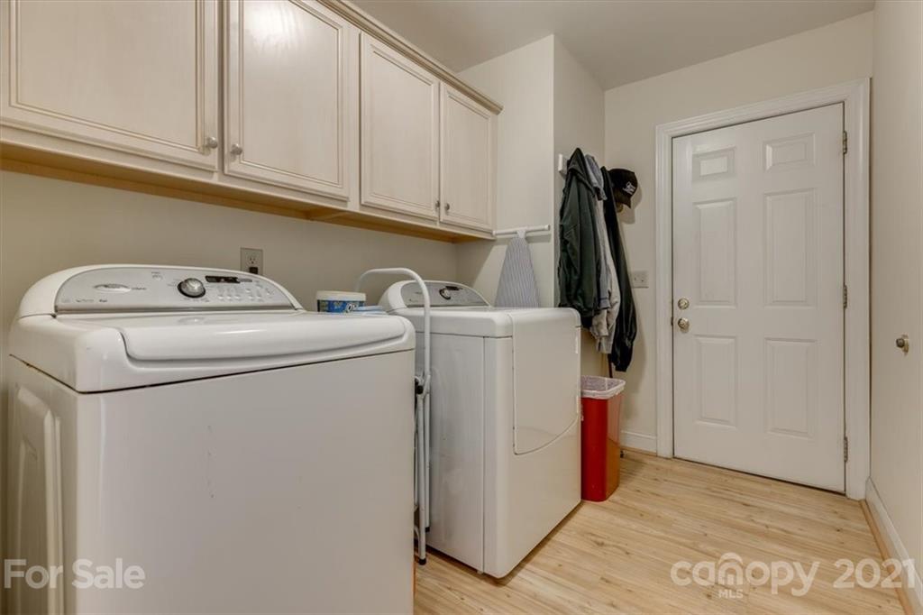 704 Beechnut Court Fort Mill, SC 29708 - Photo 39 of 46 a utility room with dryer and washer