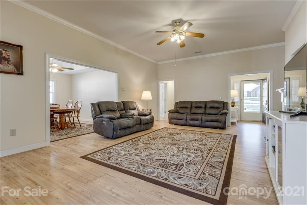 704 Beechnut Court Fort Mill, SC 29708 - Photo 9 of 46 a living room with furniture and a couch